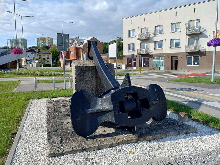 The anchor of the ship MS Starachowice displayed as a monument by a street in Starachowice