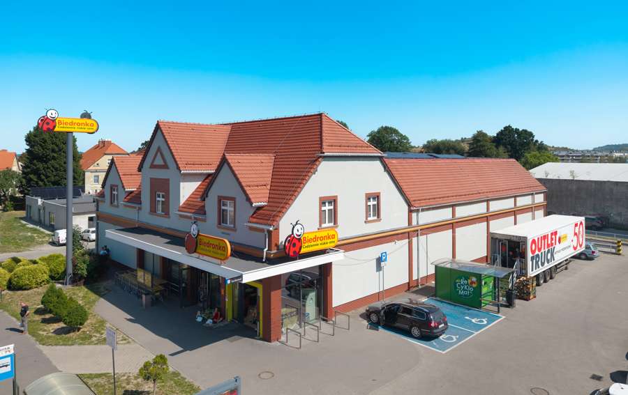 A Biedronka supermarket with its red ladybird logo in a small Polish town