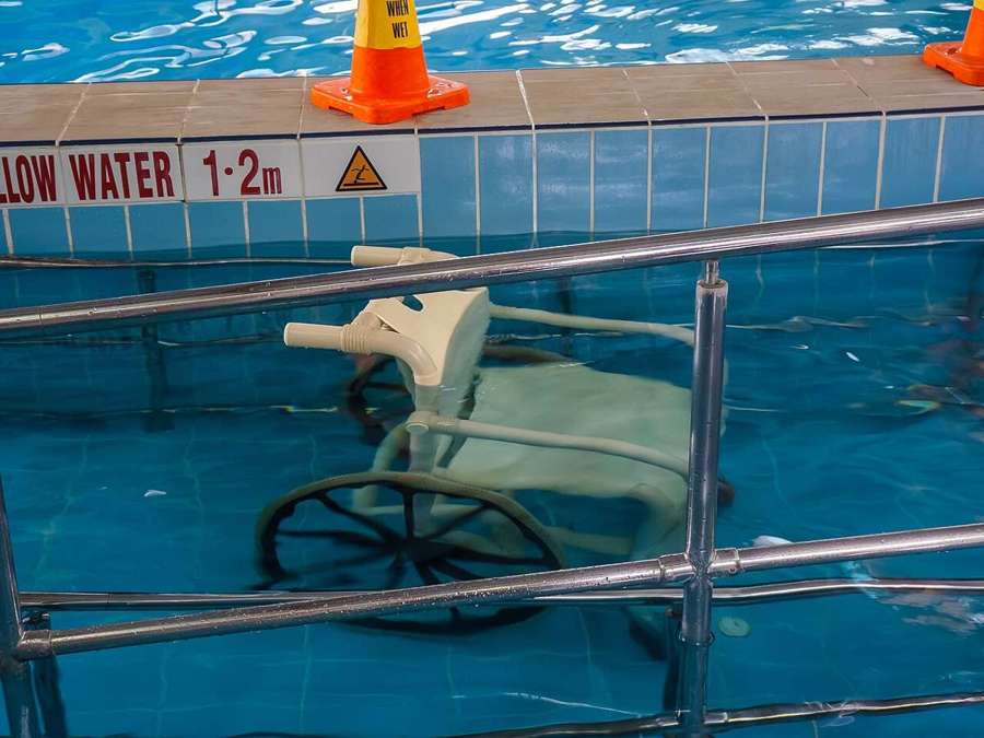Aquatic wheelchair at a swimming pool