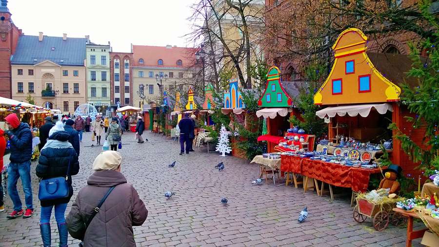 Colourful stalls of the Toruń Christmas market on the Old Town Market Square, December 2015