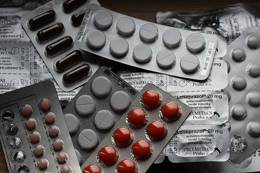 Illustrative blister packs of medicines, not evidence of expiry or a treatment recommendation