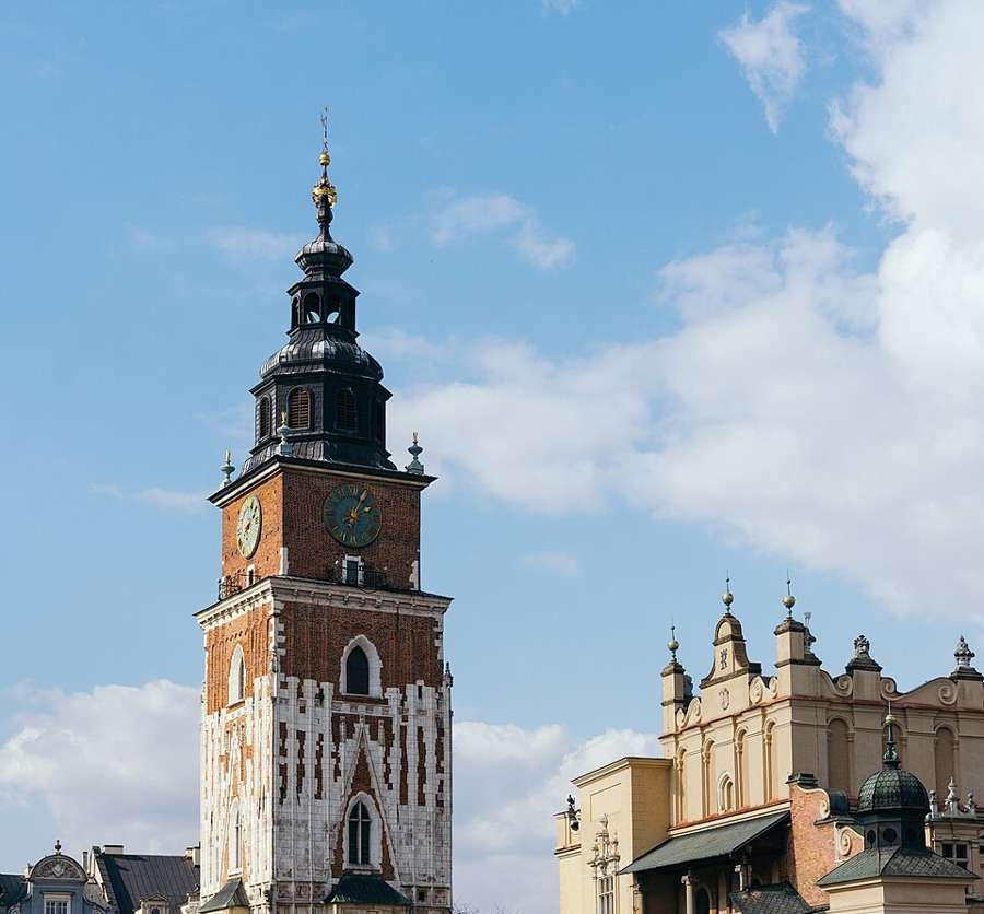 Kraków's Main Square towers - a more compact, more historic, slightly slower daily life