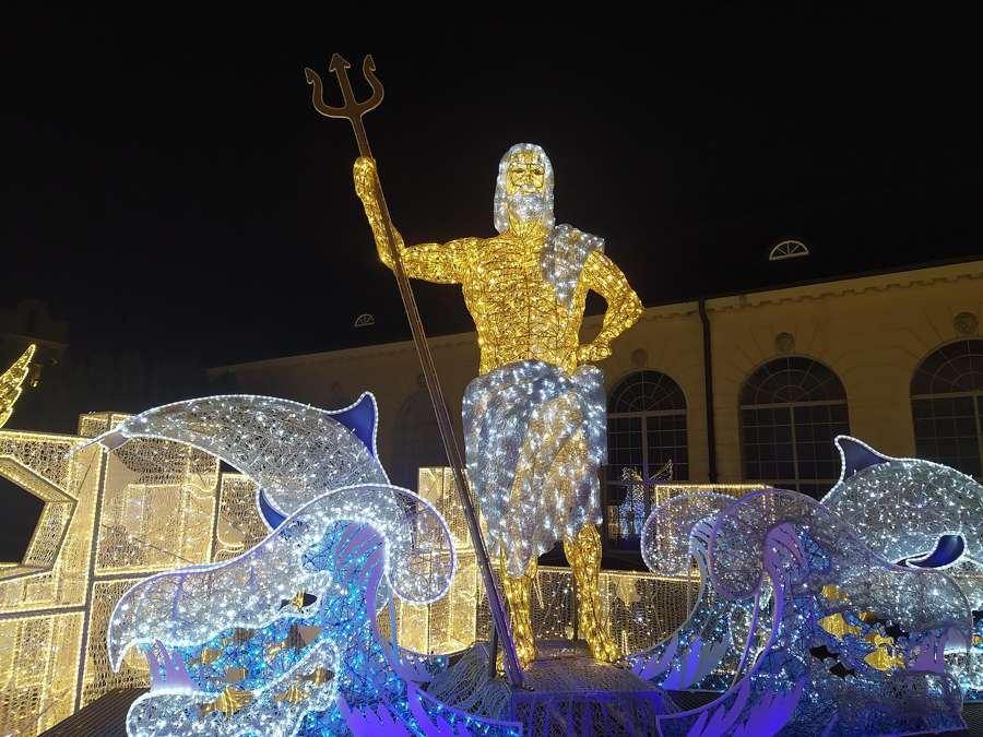 Neptune and dolphins in lights at Wilanow's Royal Garden of Light, December 2022 edition