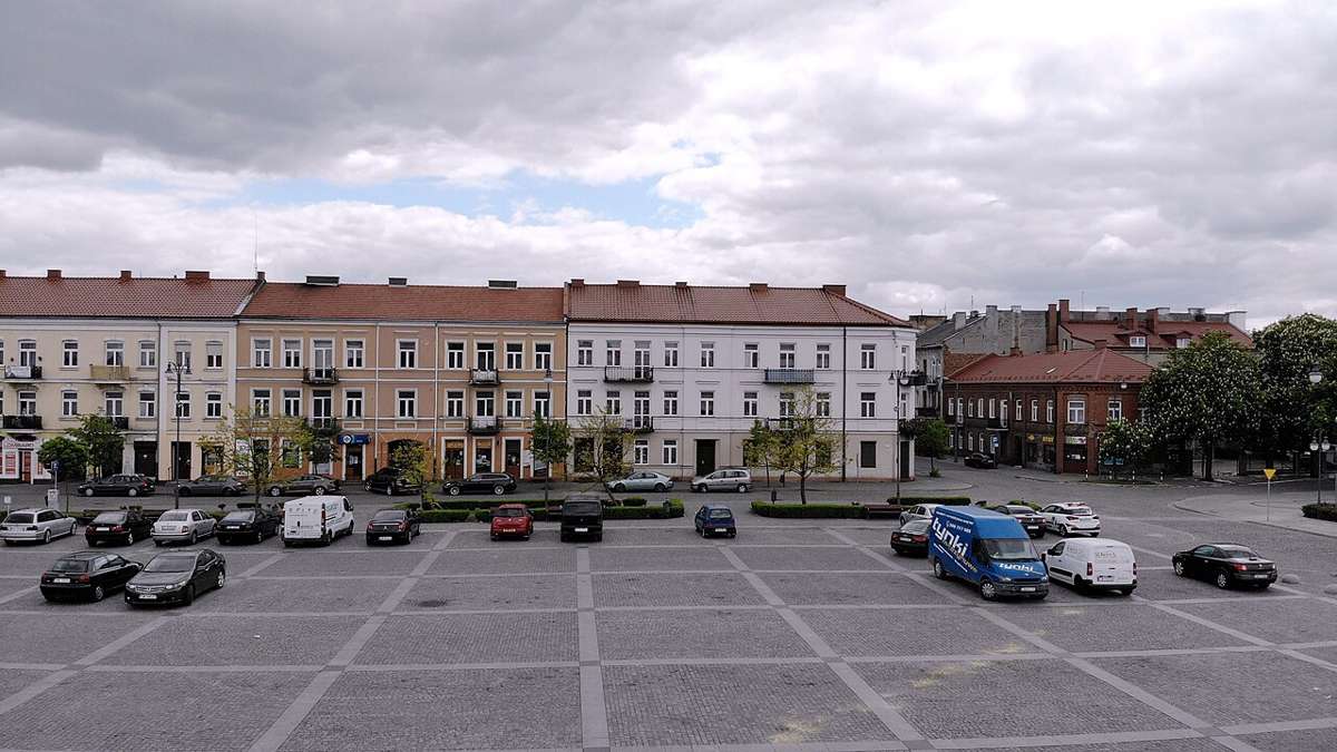 Old Town square in Włocławek with parked cars