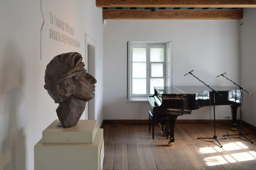 Inside the manor: the birthplace room with the salon piano where the Sunday recitals are played