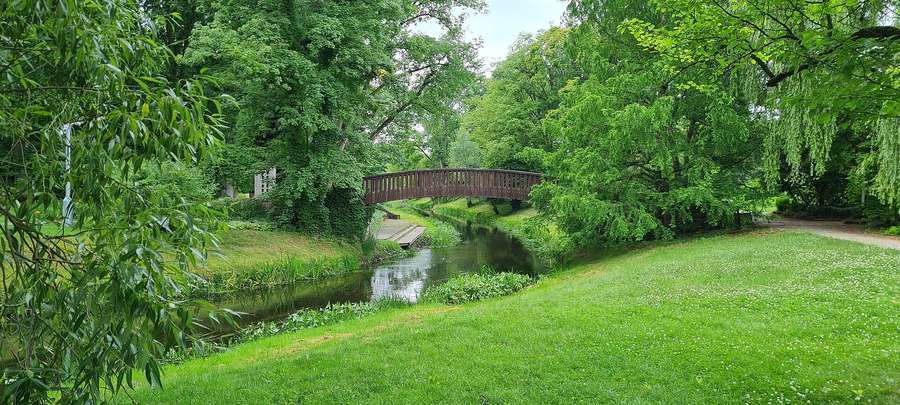 The park at Żelazowa Wola - a bridge over the Utrata river in Chopin’s birthplace garden